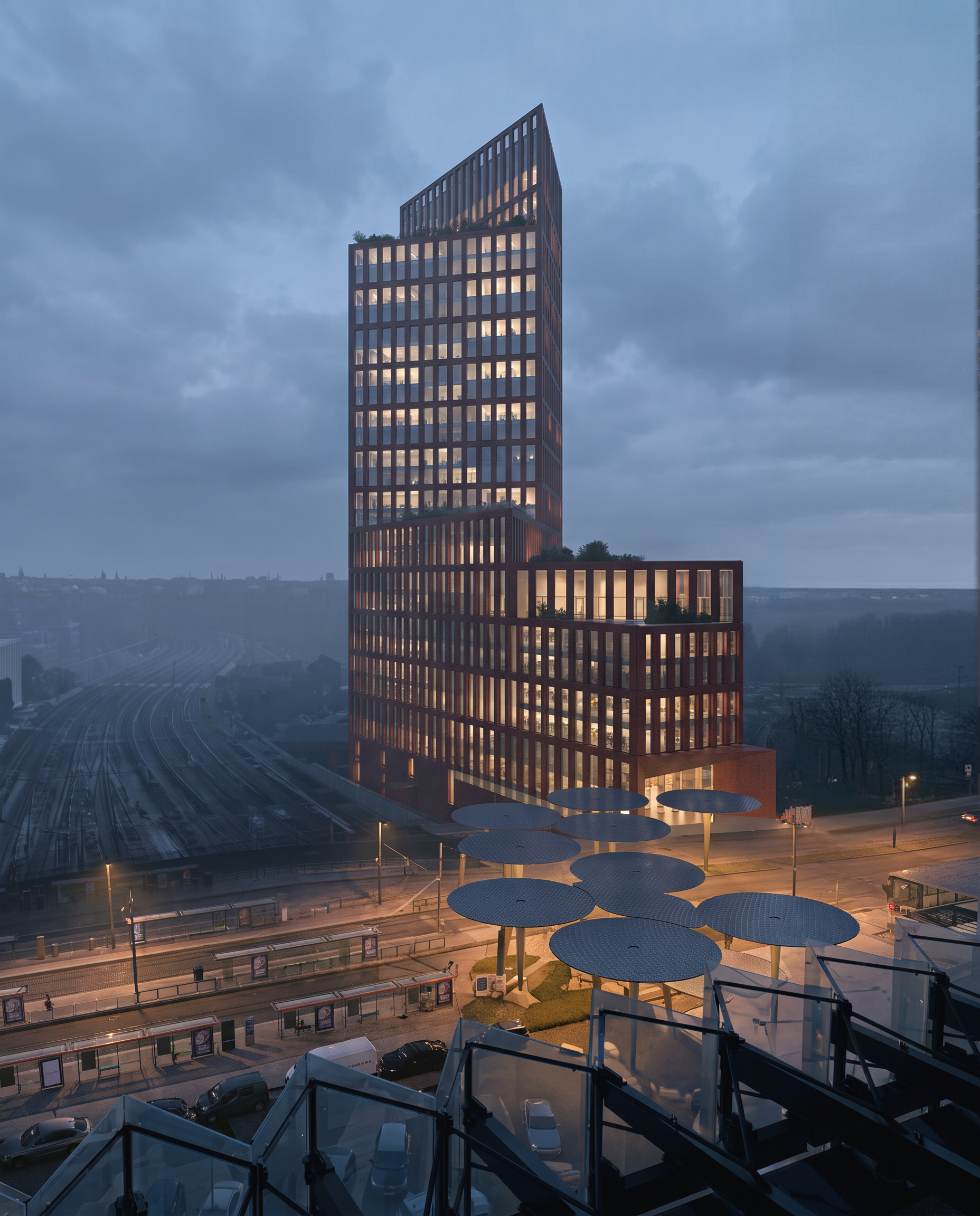 Node at dusk above circular plaza canopies